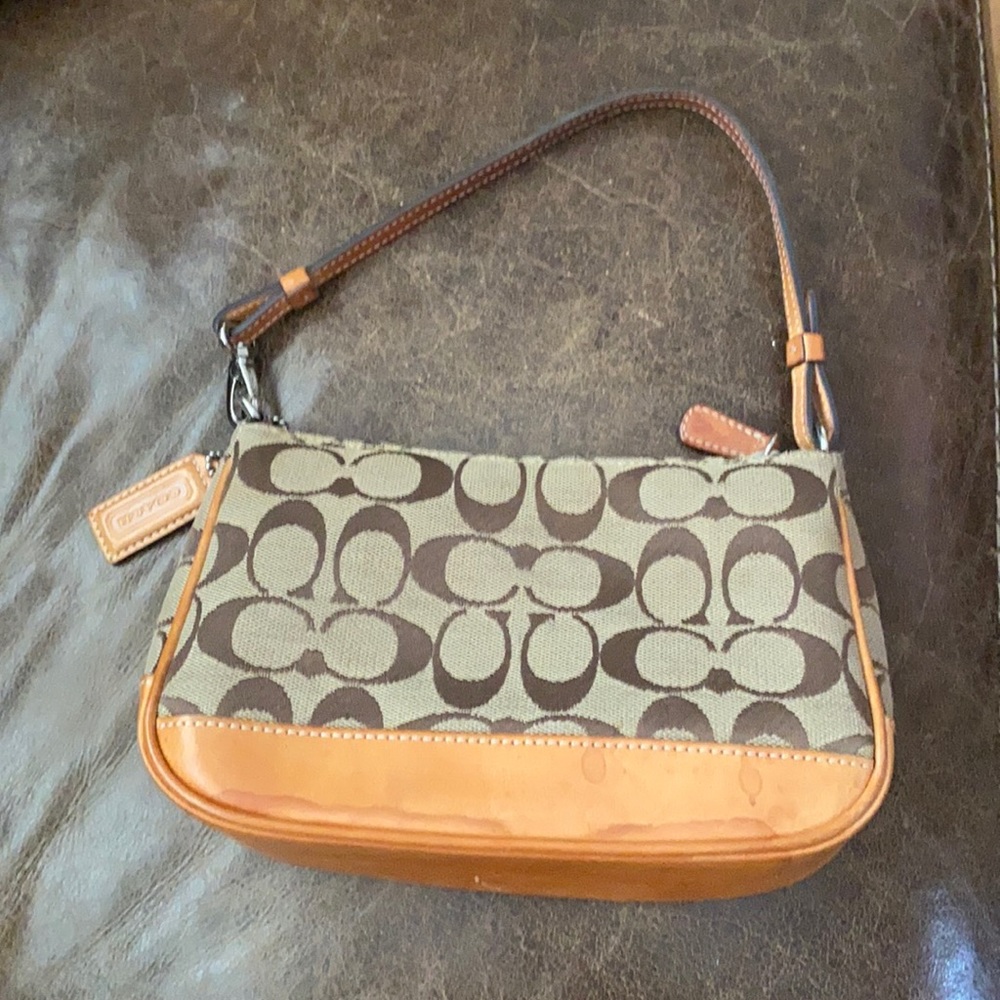 Coach bag. Make me an offer. 9 by 11in